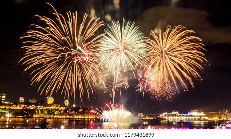 Green And Gold Fireworks During A Summer Festival In Quebec City, Canada.