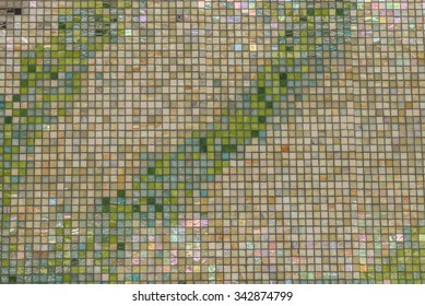 Green and gold tiles.  Colorful tile sidewalk for use as an advertising background/message, or for use as wallpaper. - Powered by Shutterstock