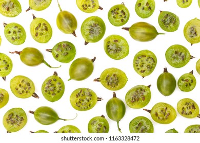Green gooseberry fruit closeup, isolated on white background. Carefully lay the ripe green berries of gooseberries. Whole and sliced berries of gooseberry. Half of the berries of gooseberry. - Shutterstock ID 1163328472