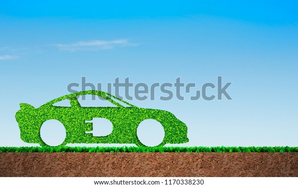 Green grass in car shape, on blue sky and soil\
cross section background, concept of ECO, renewable energy and\
circular economy