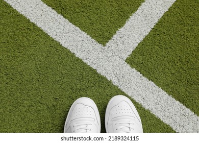 Green Grass Tennis Court With White Lines And White Leather Tennis Shoes, No Person