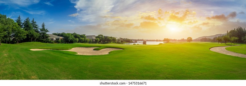 Green grass and woods on a golf field - Shutterstock ID 1475316671