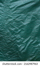 Green Grid Plastic Foil Film. Greenhous Plastic Cover. Texture. Background. Front View