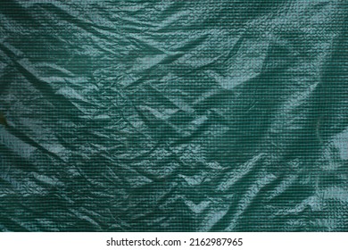 Green Grid Plastic Foil Film. Greenhous Plastic Cover. Texture. Background. Front View