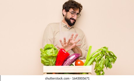 Green Grocery Man Feeling Disgusted And Nauseous, Backing Away From Something Nasty, Smelly Or Stinky, Saying Yuck