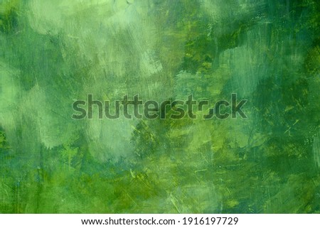 Green grunge backdrop, worn background or texture 