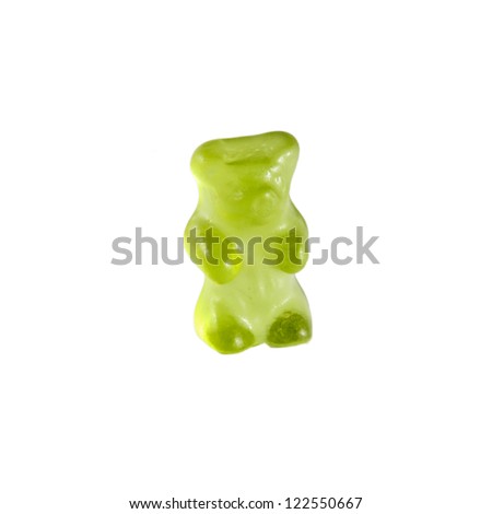Green gummy bear isolated on white