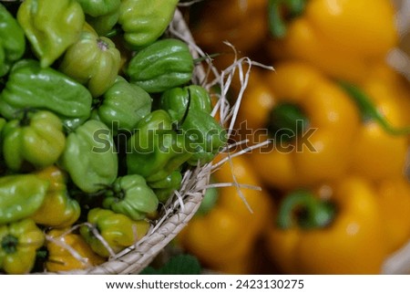 green habanero peppers in a basket