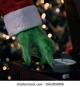 A Green Hairy Hand Scratches The Record