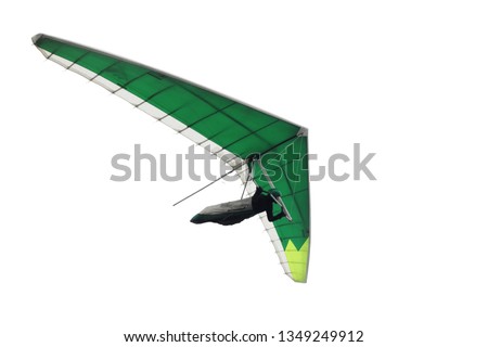 Green hang glider wing isolated on white. Extreme action sport