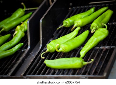 Green Hatch Chiles Roasting On The Grill.