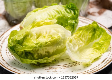 Green Heads Of Fresh Italian Baby Cos Romaine Lettuce Close Up