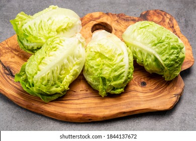 Green Heads Of Fresh Italian Baby Cos Romaine Lettuce Close Up