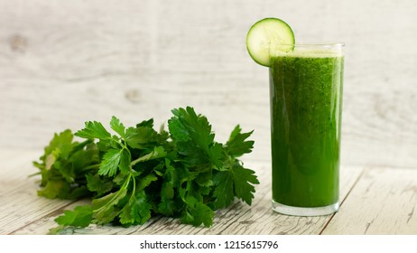 Green healthy detox cucumber, lemon and parsley juice - Powered by Shutterstock