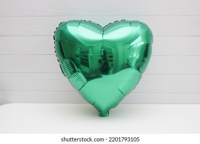 Green Heart Balloon Isolated On White Background