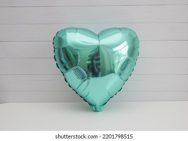 Green Heart Balloon On White Background