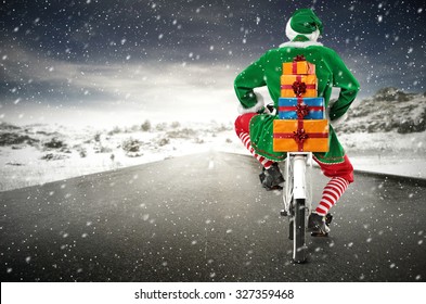 Green Helper Of Santa Claus On Bike 