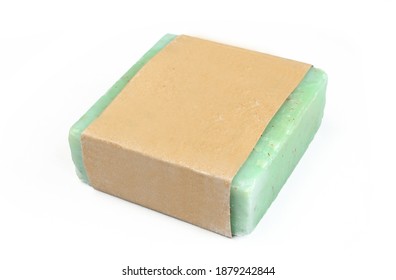 Green Herbal Soap Isolated On White Background. Homemade Soap Wrapped In Blank Paper