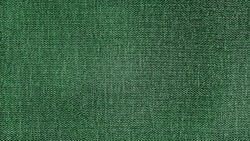 Green Herringbone Tweed Pattern, Wool Fabric Background Texture. Interior Material Background. Illumination Background.