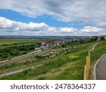 Green hills and clouds view from  Belvedere Park with Sibiu City in Background