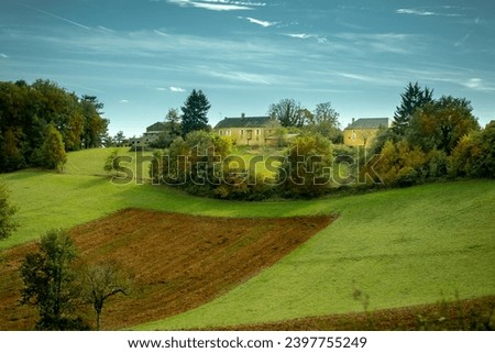 Green hilly landscape with blue sky background