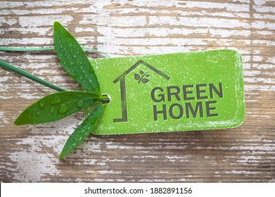 Green Home Natural Label On Wooden Background