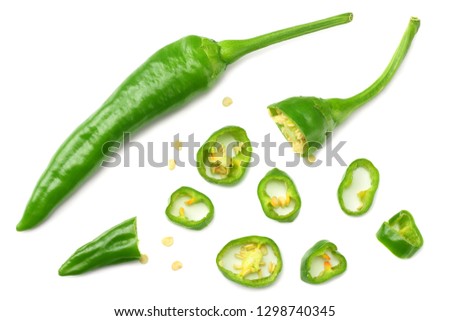 green hot chili peppers with slices isolated on white background top view