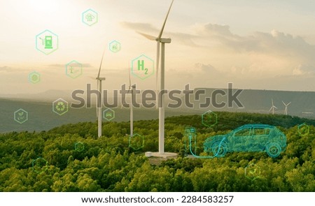 Green hydrogen gas production at wind farm. Sustainable renewable energy. Electric car filling H2 at hydrogen fueling station. H2 Fuel cell vehicle. Net zero emission. Future energy. Green technology.