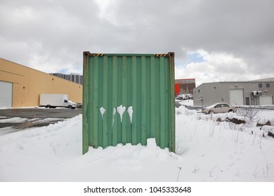  A Green Industrial Storage Container Unit In The Winter