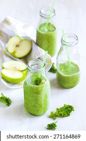 Green Juice In Bottle. Healthy Drink.