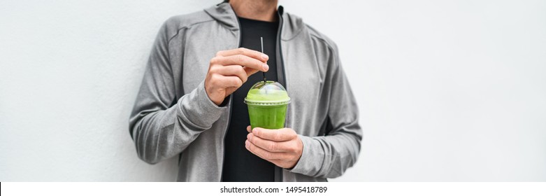 Green Juice Detox Drink Healthy Man Drinking Green Smoothie Cup Protein Shake Panoramic Banner. Vegan Meal Replacement Diet At Cafe. Spinach Morning Breakfast Panorama. Healthy Eating Lifestyle.