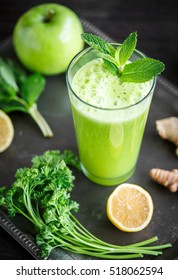 Green Juice Made From Parsley, Mint, Lemon, And Ginger