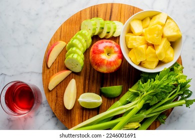 Green Juice or Smoothie Ingredients. Healthy green juices and smoothies made with organic vegetables, kale, spinach, celery, strawberries, peanut butter, dates, bananas, apples and beets. - Powered by Shutterstock