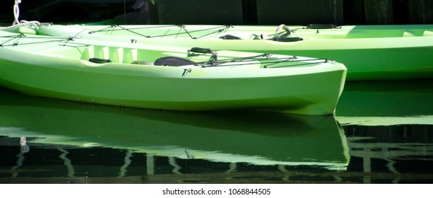 Green kayaks at lake Travis, Lakeway, Texas