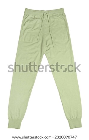 Green knitted pants isolated on white background