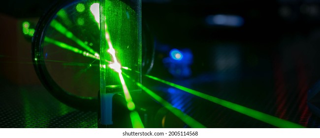 Green Laser On Optical Table In A Quantum Optics Laboratory