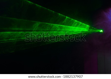 Green lasers for show in smoke