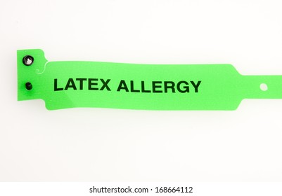 A Green Latex Allergy Bracelet Isolated On White