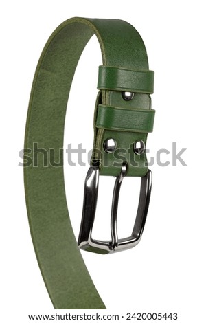 Green leather belt with metal buckle close-up on a white background.
