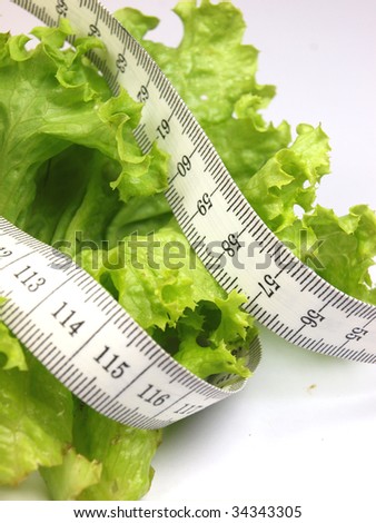 Similar – Image, Stock Photo Fresh leaf salad with a measuring tape on a board