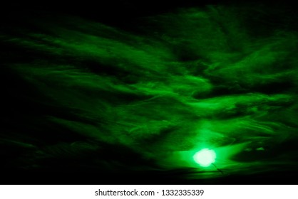 Green light in the darkness