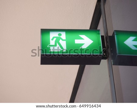 Green light emergency exit fire escape wayout sign