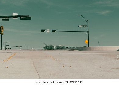 A Green Light On A Barren Road.