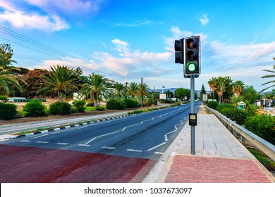 Green Light On Traffic Light And Road