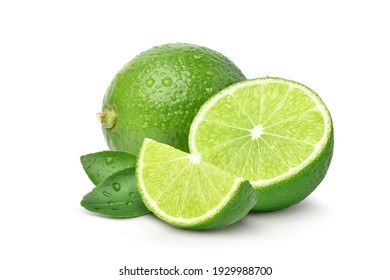 Green lime with cut in half and slices isolated on white background. 