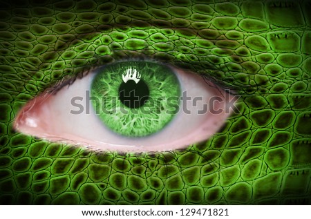 Green lizard pattern on face