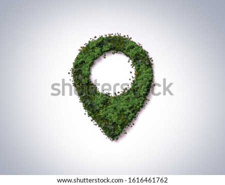 Green location symbol of pin. A green forest shape on location pin concept of green place for tourist or visit. Green Destination. Environment day concept. World Forestry Day.
