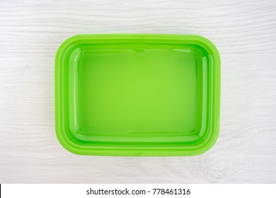 Green Lunchbox On White Background Top View