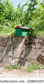 Green Mailbox House Shape In Rural House Entrance