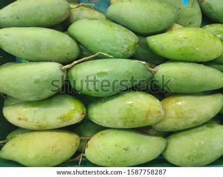 Green mango for the background